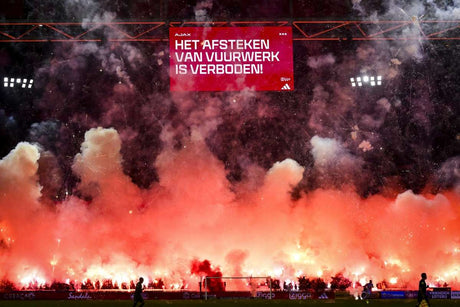 Eredivisie clash between Ajax and FC Groningen abandoned after fireworks halted play